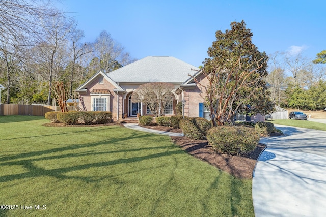 view of front of home with a front lawn