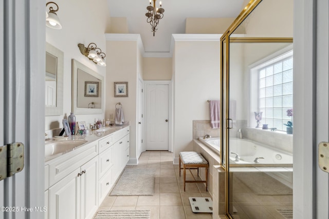 bathroom featuring a relaxing tiled tub, tile patterned floors, vanity, and ornamental molding