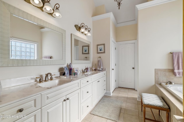 bathroom featuring a relaxing tiled tub, vanity, ornamental molding, and tile patterned flooring