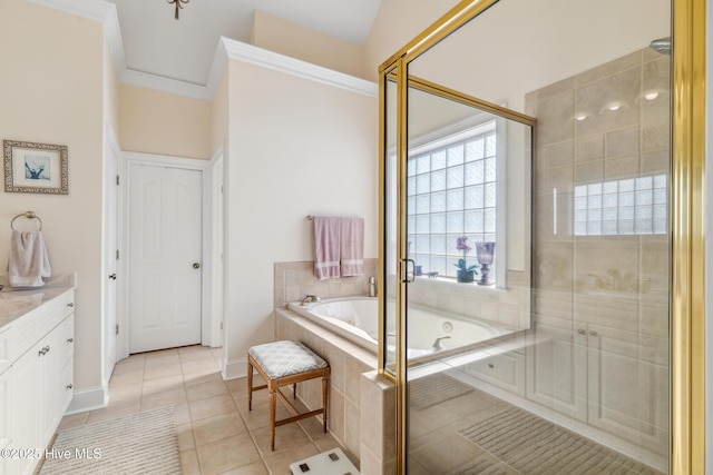 bathroom with ornamental molding, shower with separate bathtub, tile patterned floors, and vanity