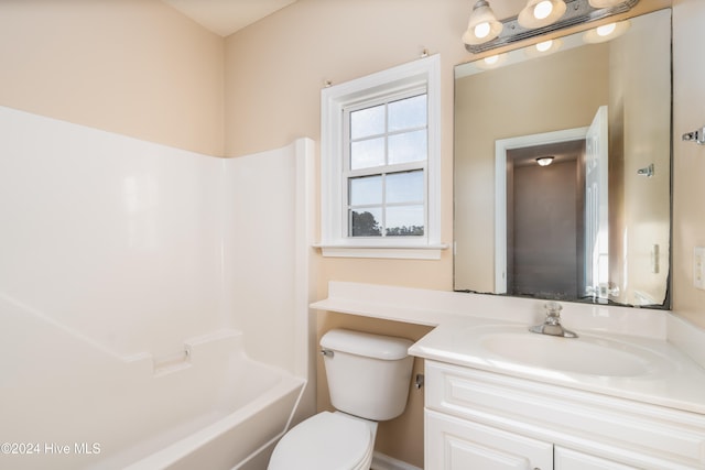 full bathroom with vanity, tub / shower combination, and toilet