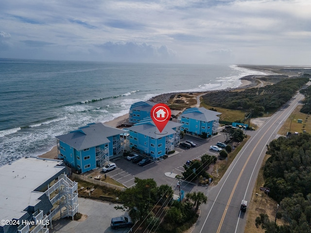 bird's eye view with a beach view and a water view