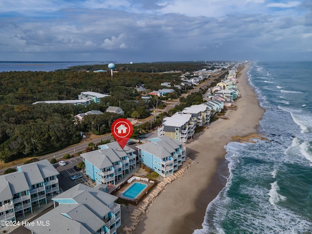 bird's eye view with a beach view and a water view