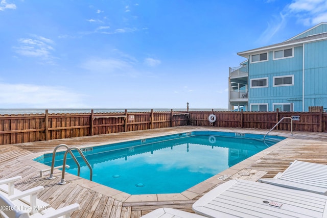 view of pool featuring a wooden deck