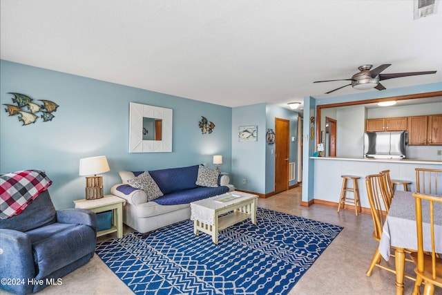 living room featuring ceiling fan