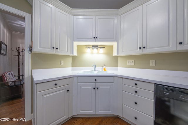 kitchen featuring ornamental molding, sink, black dishwasher, dark hardwood / wood-style floors, and white cabinetry