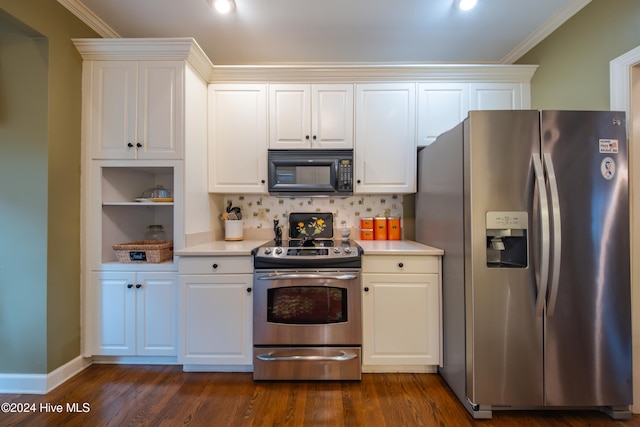 kitchen featuring dark hardwood / wood-style flooring, white cabinets, stainless steel appliances, and ornamental molding