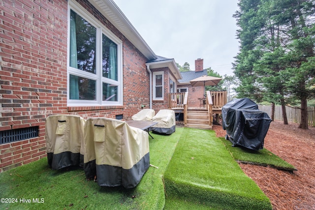 view of yard featuring a deck