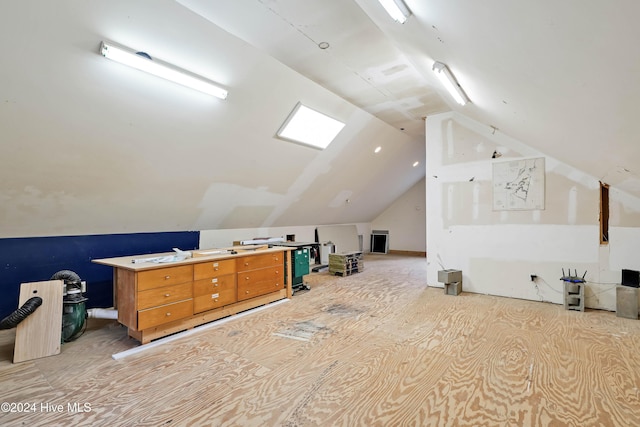 bonus room featuring lofted ceiling