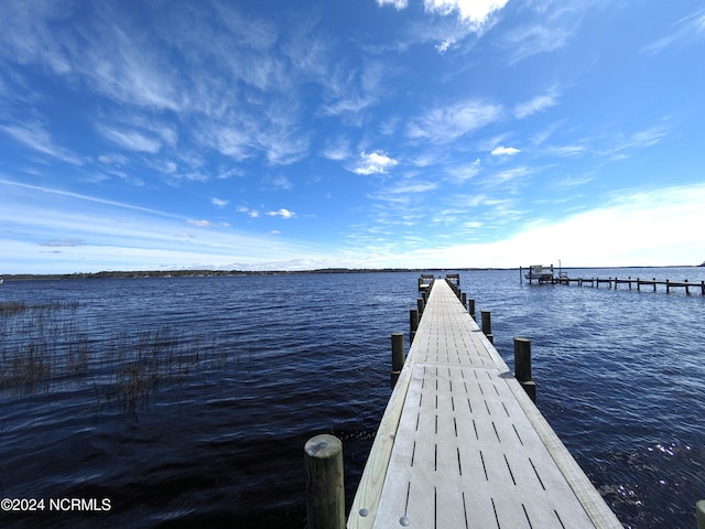 view of dock with a water view