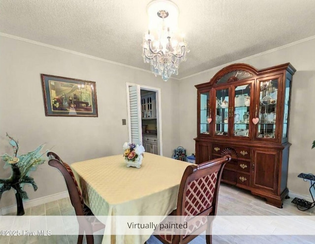 117 Longwood Dr, Stella, NC 28582 - dining room with a chandelier, a textured ceiling, baseboards, and ornamental molding