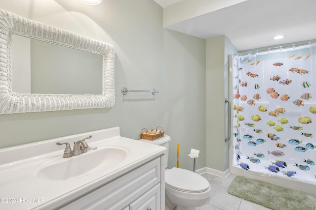 bathroom with a shower with curtain, tile patterned flooring, vanity, and toilet