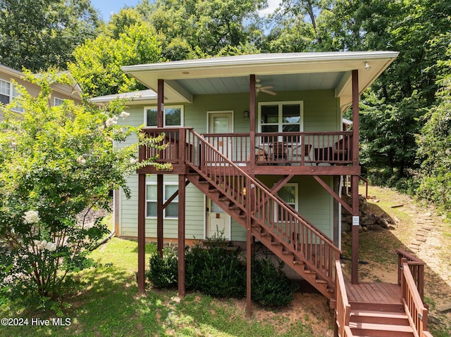 back of house with ceiling fan