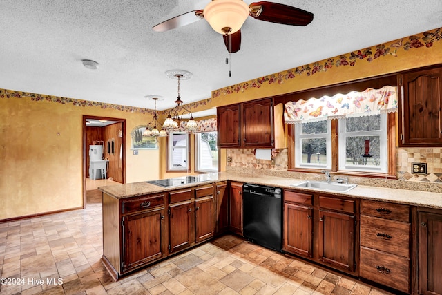 kitchen with sink, kitchen peninsula, pendant lighting, a textured ceiling, and black appliances