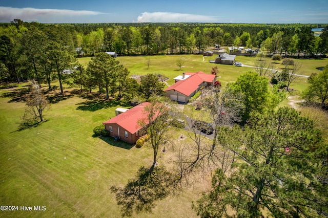 birds eye view of property with a rural view