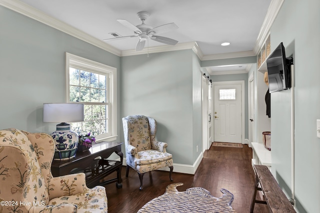 1831 Hawthorne Rd, Wilmington, NC 28403 - entrance foyer featuring healthy amount of natural light, a ceiling fan, wood finished floors, baseboards, and ornamental molding