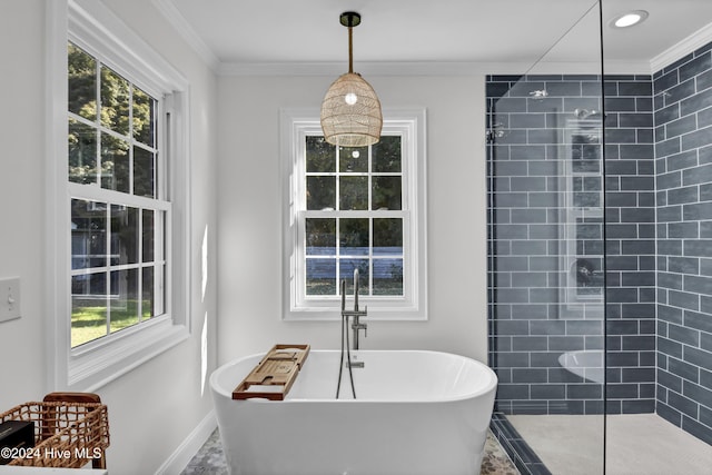 bathroom with a tile shower and ornamental molding