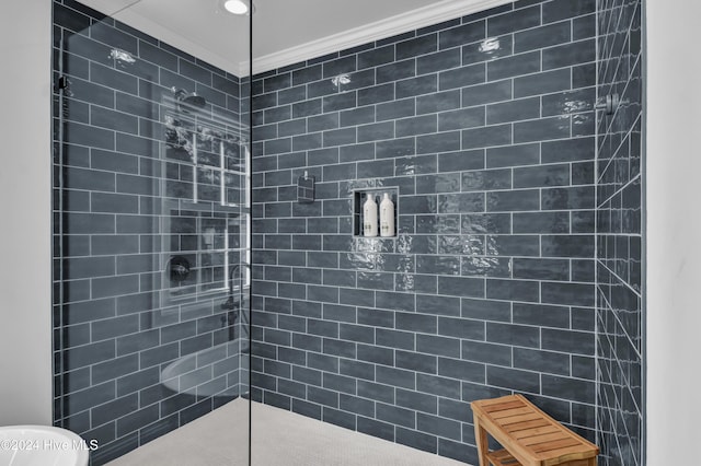1831 Hawthorne Rd, Wilmington, NC 28403 - bathroom with a tile shower, crown molding, and toilet