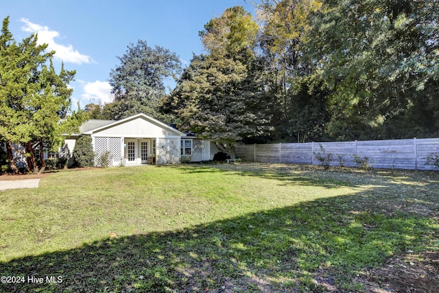 1831 Hawthorne Rd, Wilmington, NC 28403 - view of yard featuring french doors