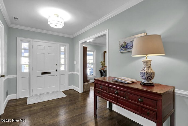 1831 Hawthorne Rd, Wilmington, NC 28403 - entryway with dark wood-style flooring, crown molding, and baseboards