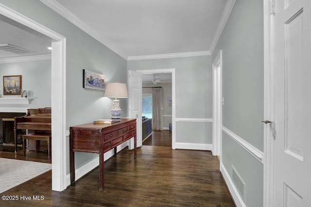 1831 Hawthorne Rd, Wilmington, NC 28403 - hallway featuring wood finished floors, crown molding, and baseboards