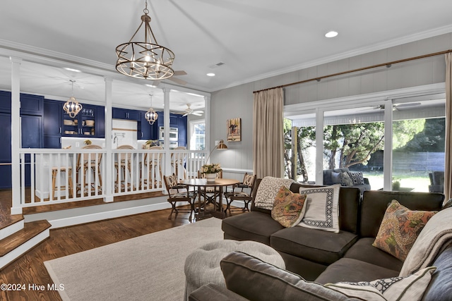 1831 Hawthorne Rd, Wilmington, NC 28403 - living area featuring a chandelier, decorative columns, wood finished floors, ornamental molding, and recessed lighting