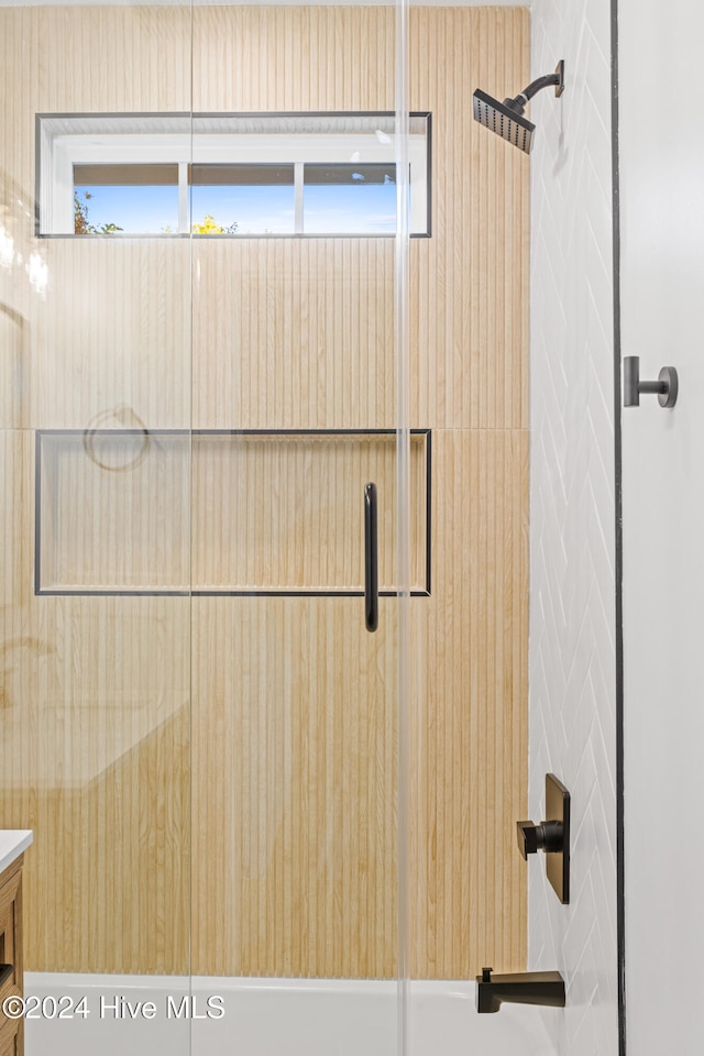 interior space featuring an enclosed shower