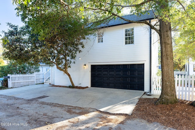 view of home's exterior with a garage