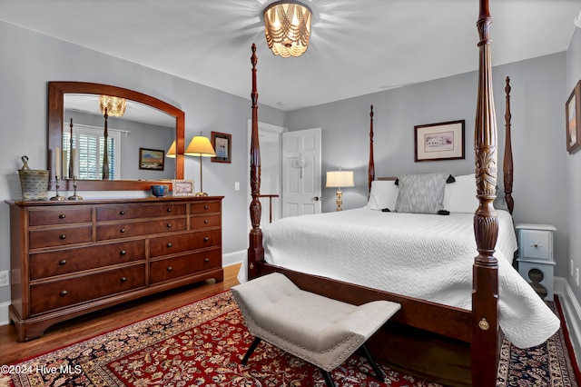 bedroom featuring hardwood / wood-style flooring