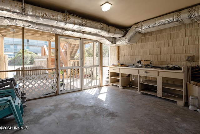 714 Ocean Blvd, Topsail Beach, NC 28445 - basement featuring a workshop area and healthy amount of natural light