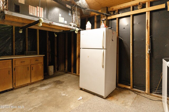 714 Ocean Blvd, Topsail Beach, NC 28445 - below grade area with freestanding refrigerator