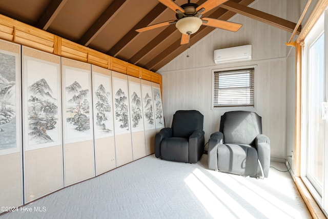 sitting room featuring lofted ceiling with beams, a wall unit AC, ceiling fan, and wood walls