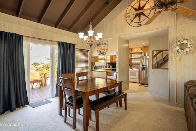 714 Ocean Blvd, Topsail Beach, NC 28445 - dining area with high vaulted ceiling, light carpet, a chandelier, beamed ceiling, and ceiling fan