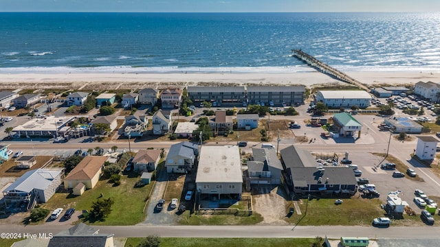 drone / aerial view with a view of the beach and a water view