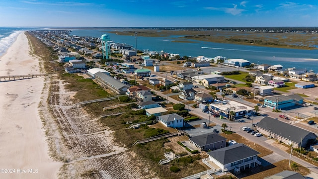 aerial view with a beach view and a water view