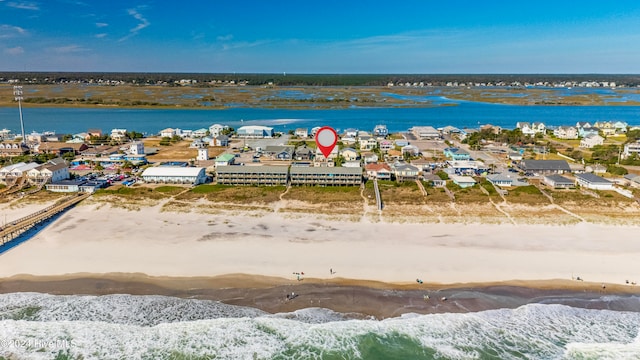 drone / aerial view with a water view