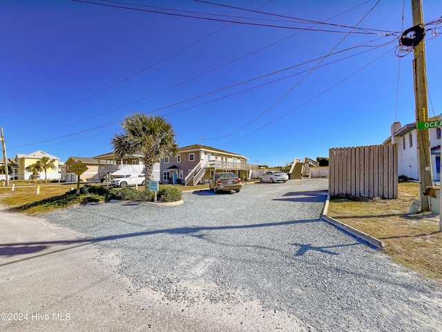714 Ocean Blvd, Topsail Beach, NC 28445 - view of front of property with a residential view and stairway