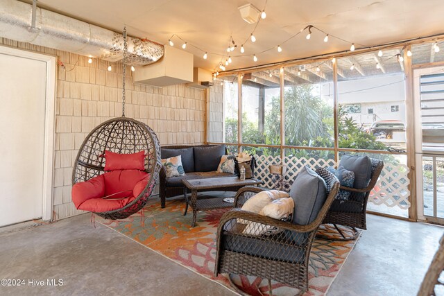 714 Ocean Blvd, Topsail Beach, NC 28445 - sunroom / solarium featuring an outdoor hangout area