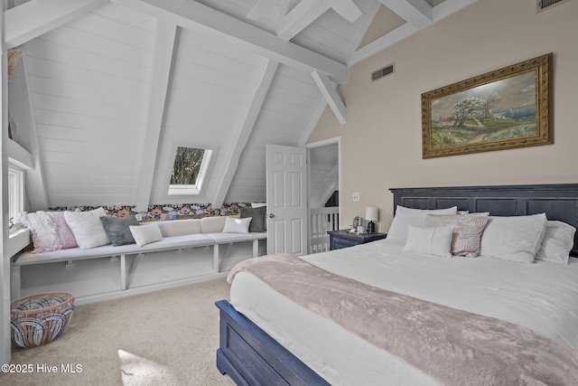 bedroom featuring vaulted ceiling with beams and carpet