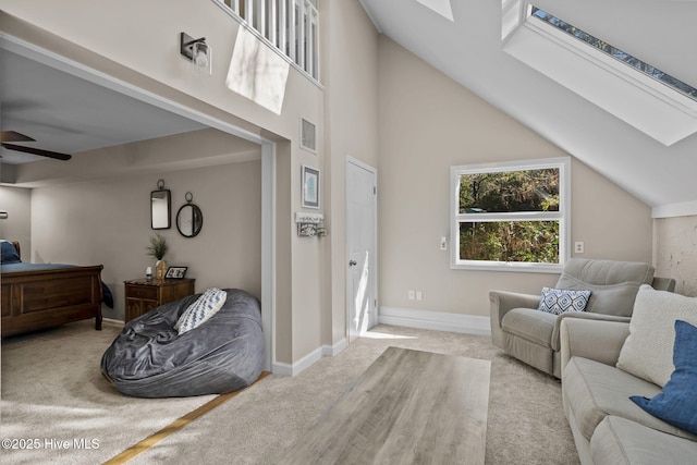 interior space with ceiling fan and vaulted ceiling