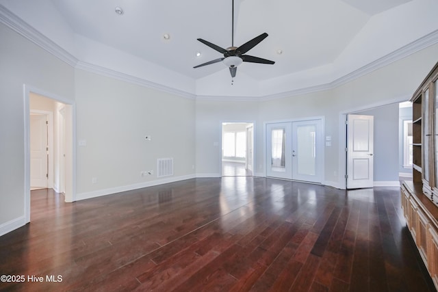 unfurnished living room featuring ceiling fan, french doors, dark hardwood / wood-style flooring, built in features, and high vaulted ceiling