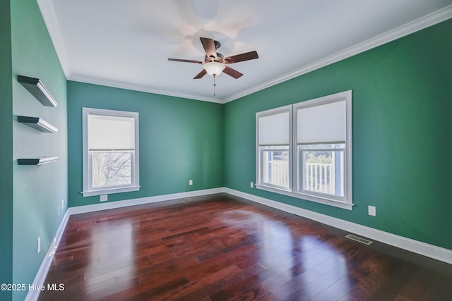 unfurnished bedroom featuring dark hardwood / wood-style flooring, ceiling fan, and ornamental molding