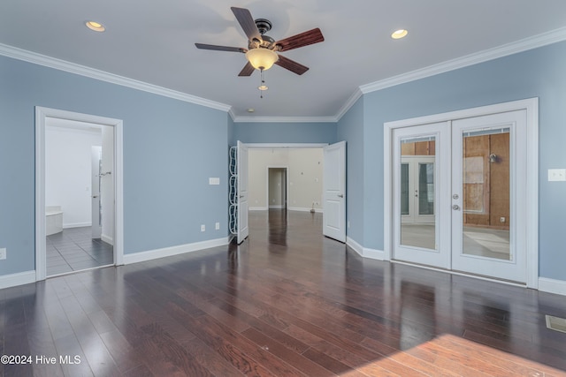 empty room featuring dark wood-type flooring, ceiling fan, and ornamental molding