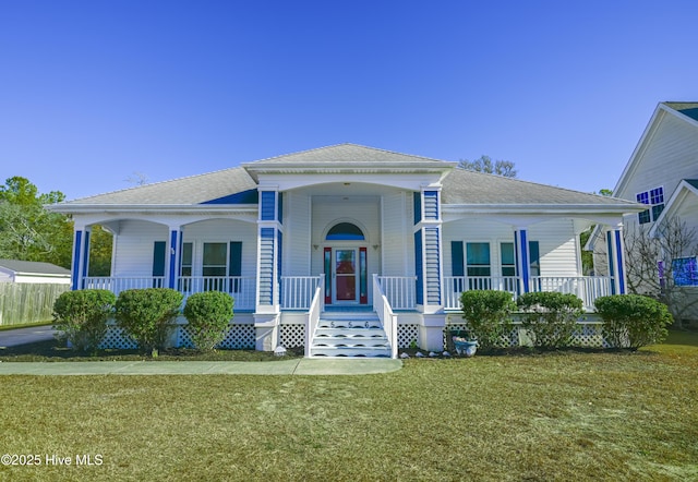 view of front of house featuring a front yard and a porch