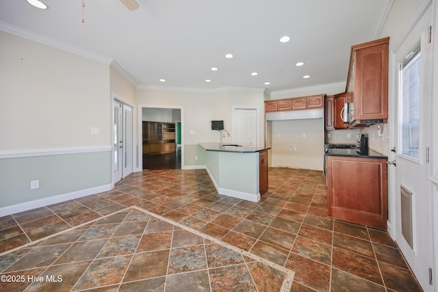 kitchen featuring decorative backsplash, black gas stove, ornamental molding, and sink