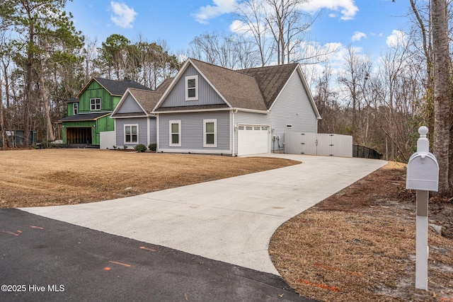 view of front facade with a garage and a front yard