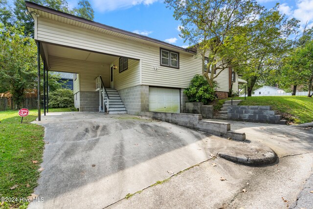 view of front of property with a garage