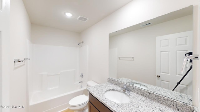 full bathroom with shower / washtub combination, vanity, and toilet