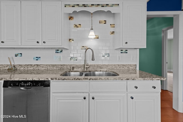 kitchen featuring white cabinetry, sink, and stainless steel dishwasher