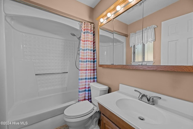 full bathroom featuring vanity, toilet, and shower / tub combo